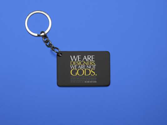 We are designers we are not gods Keychain